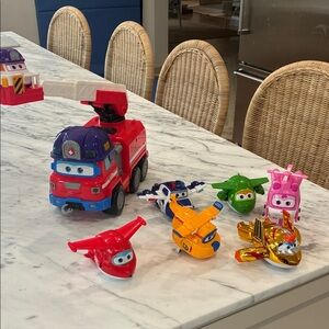 Vibrant Toy Vehicle Set with Fire Truck and Planes